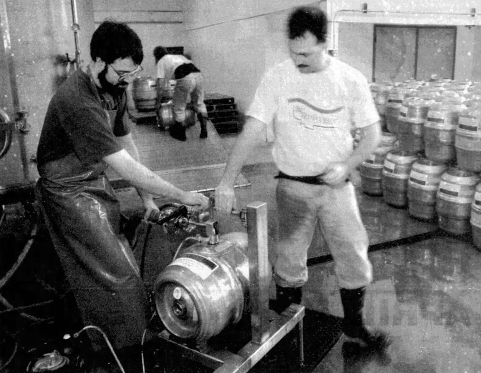 Neal Leathers and Brad Robinson keg a batch of Moose Drool